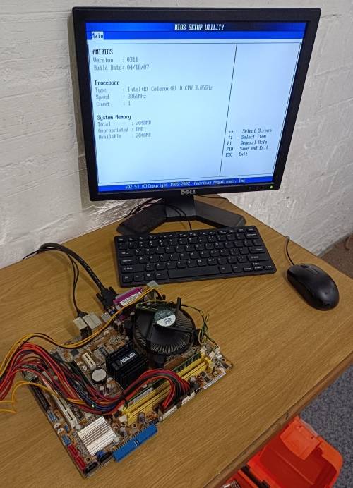 ASUS P5GC-MX motherboard + Intel Celeron 3.06Ghz CPU + 2 extra CPUs