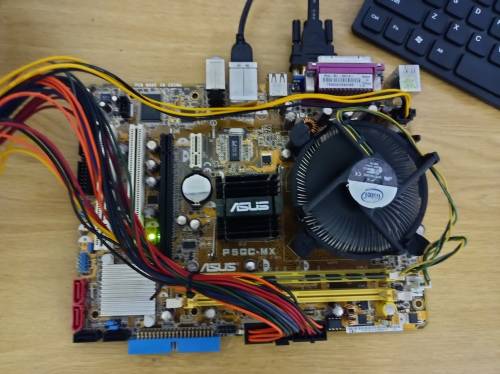 ASUS P5GC-MX motherboard + Intel Celeron 3.06Ghz CPU + 2 extra CPUs