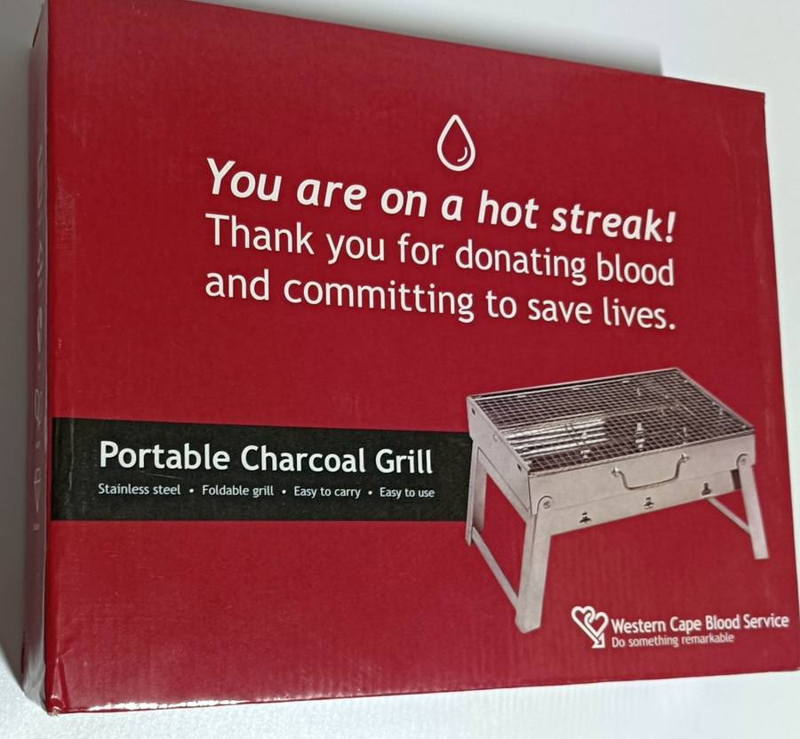 Portable stainless steel charcoal grill