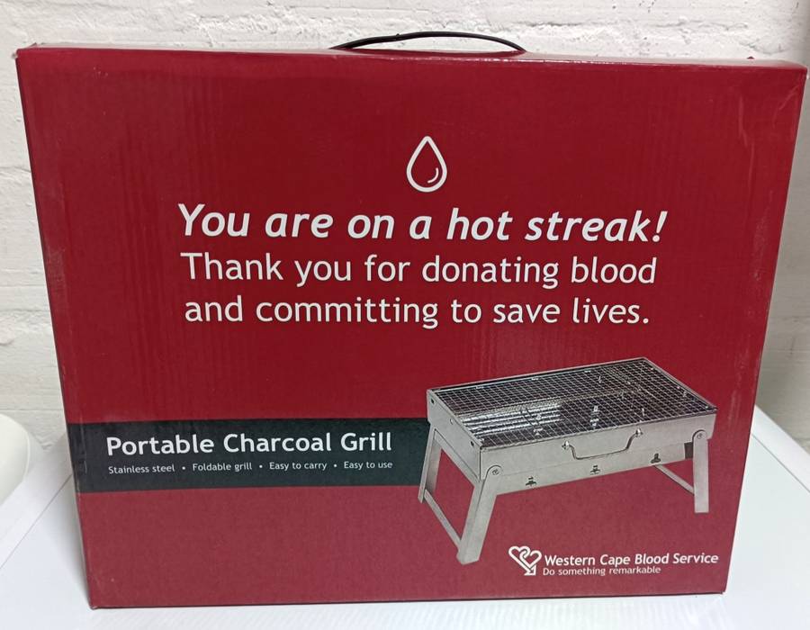 Portable stainless steel charcoal grill