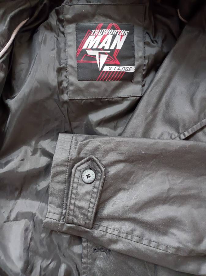 Truworths Man rain jacket in size XL. Double breasted, removeable hood