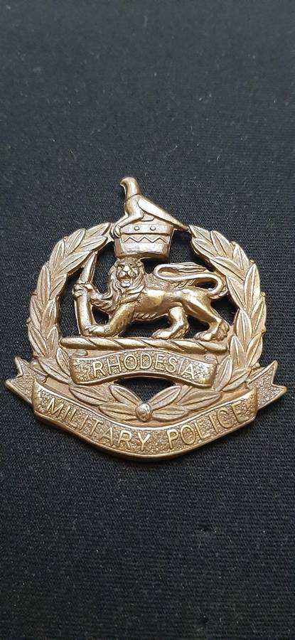 ** Rhodesian Bush War: Corps of Military Police Brass Cap Badge.**