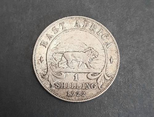 ** 1922  KGV East Africa 1 Shilling Silver Coin (.250)[ F ].**