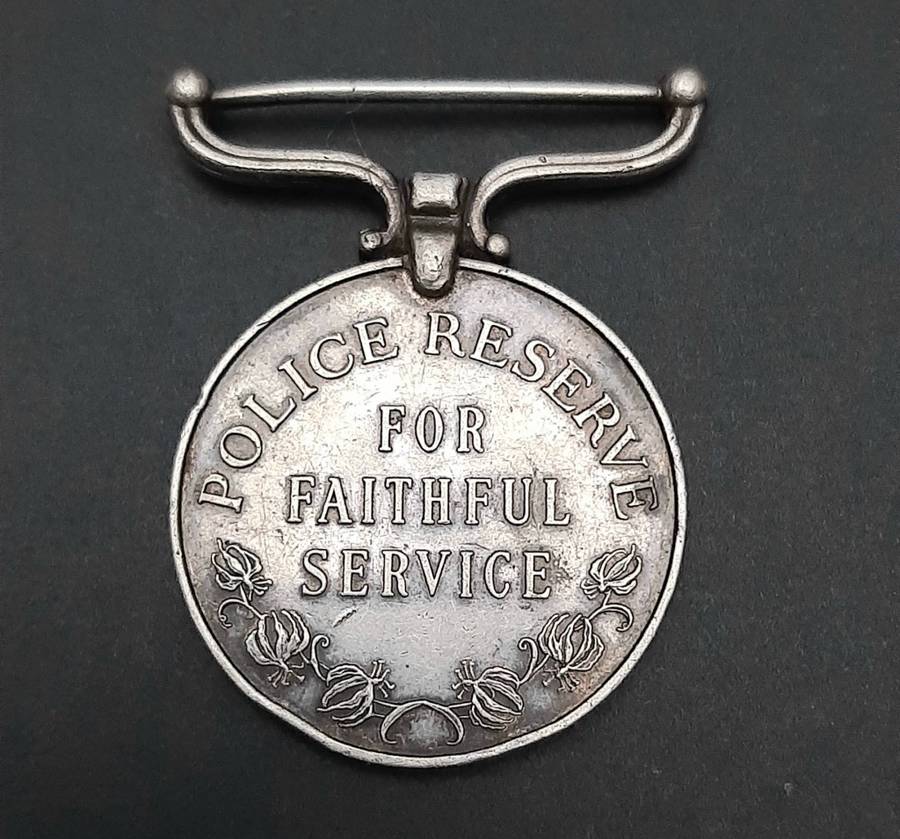 **RARE: 1960s Rhodesian Police Reserve Faithful Service Medal (att. Native).**