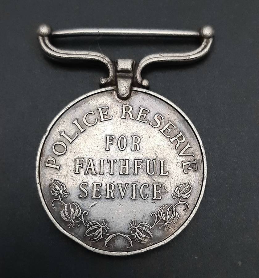 **RARE: 1960s Rhodesian Police Reserve Faithful Service Medal (att. Native).**