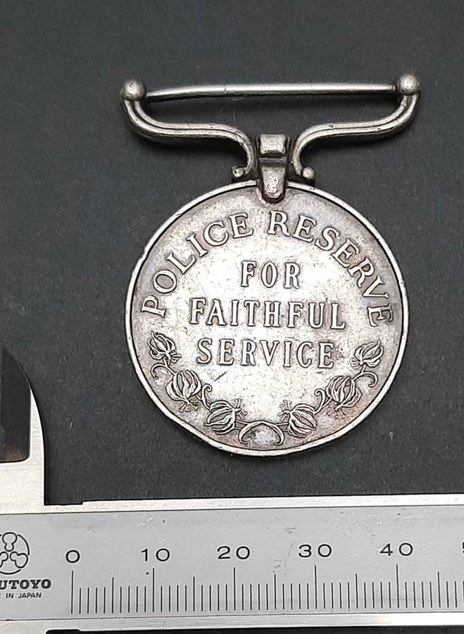 **RARE: 1960s Rhodesian Police Reserve Faithful Service Medal (att. Native).**