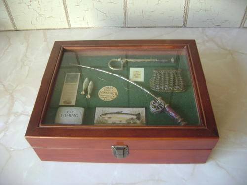 THIS FLY FISHING BOX IN GOOD CONDITION