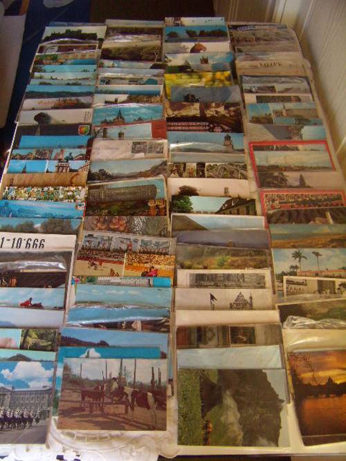 +100 Old Postcards fr4om around the world -  some used with old stamps - some unsed