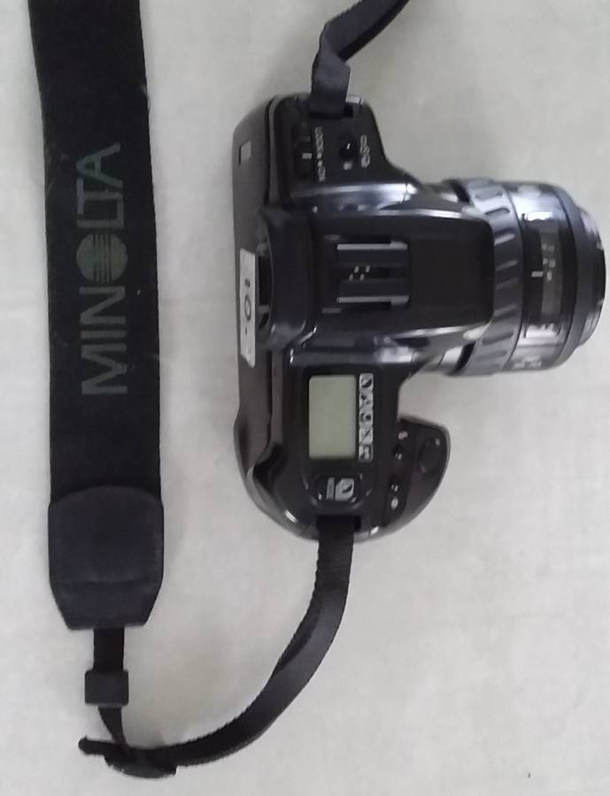 Minolta Dynax 300 si. FILM camera with 35 to 70 Zoom and auto focus and advance.