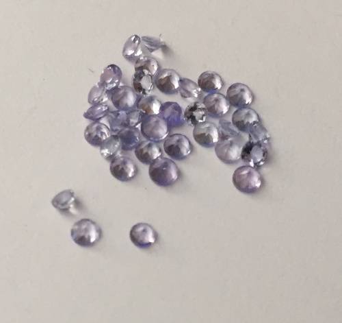 1.105cts TANZANITE - ROUND CUT - EXCELLENT TOP COLOR - 36 STONES 0.035 POINTERS
