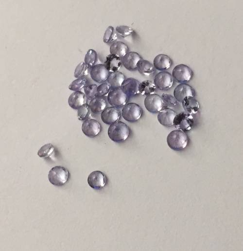 1.105cts TANZANITE - ROUND CUT - EXCELLENT TOP COLOR - 36 STONES 0.035 POINTERS
