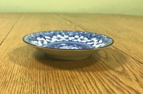 BLUE and WHITE SMALL BOWL=DISH=FLORAL GARLAND=FLOWER IN MIDDLE=BLACK RIM=NO MARKS=STUNNING ITEM!!!