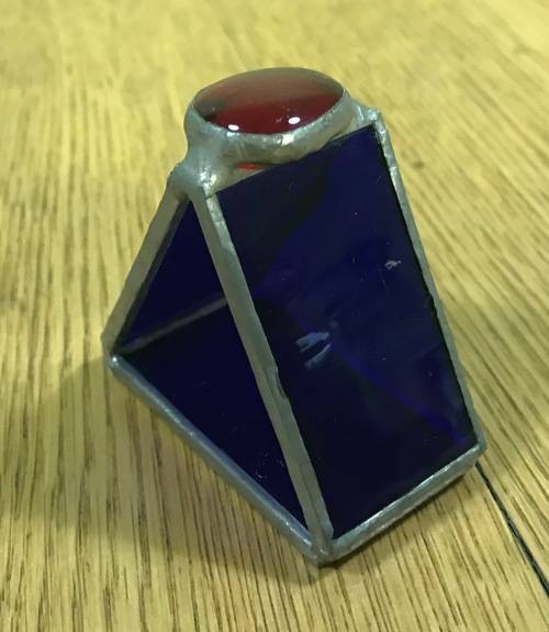 SERVIETTE RING TRIANGULAR PEWTER, TIN or LEAD??? BLUE GLASS RED GLASS CABOCHON ON TOP UNUSUAL!!!!
