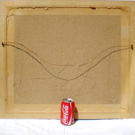 from behind and with a can of Coke