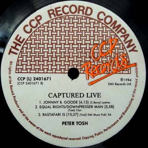 Peter Tosh - CAPTURED LIVE.  Vinyl 33 rpm LP album. (VG+/VG). Scarce S A release. (1984).