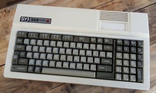 Spectravideo SV328 computer with cassette recorder and power supply.