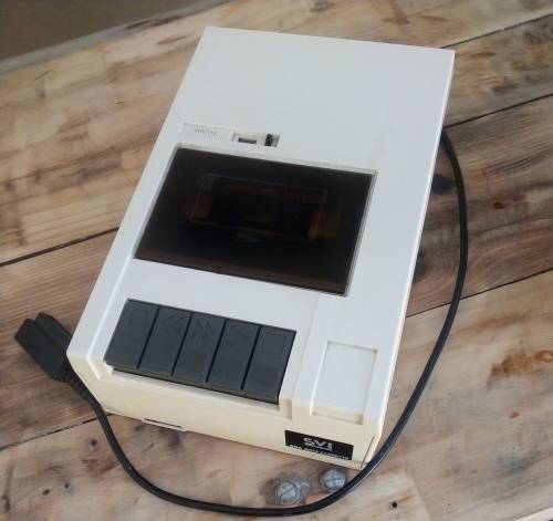 Spectravideo SV328 computer with cassette recorder and power supply.