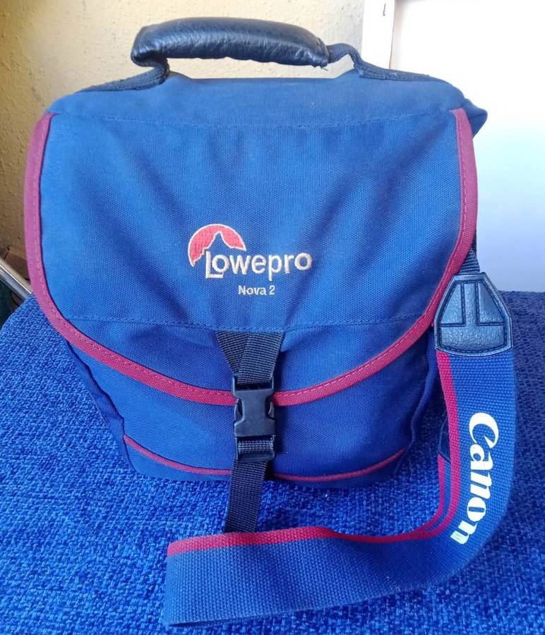 Canon EOS 500N 35mm film camera with 28 to 80mm zoom lens.