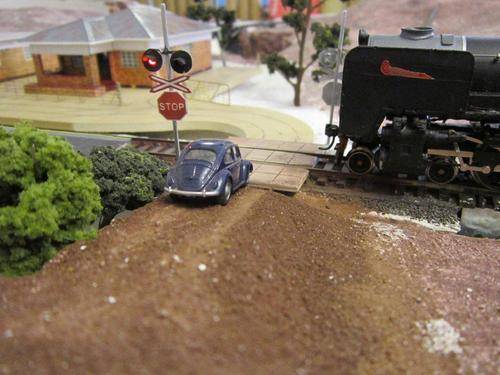 SAR HO scale level crossing with sensors.