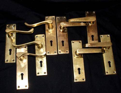 Four Sets of Brass Door Handles