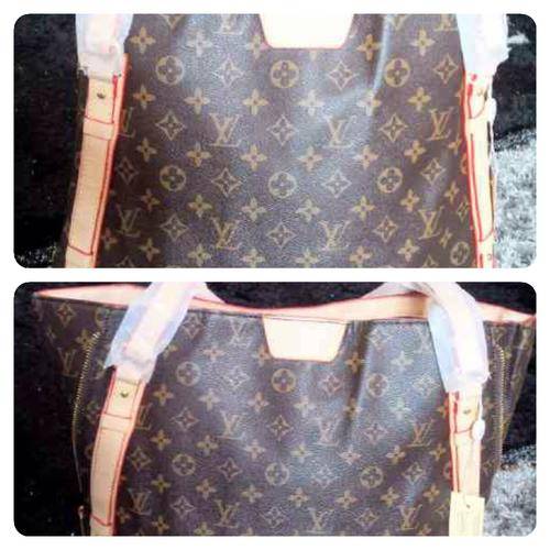 Louis Vuitton limited edition handbag. Exclusive! Can be made into 2 different shapes!