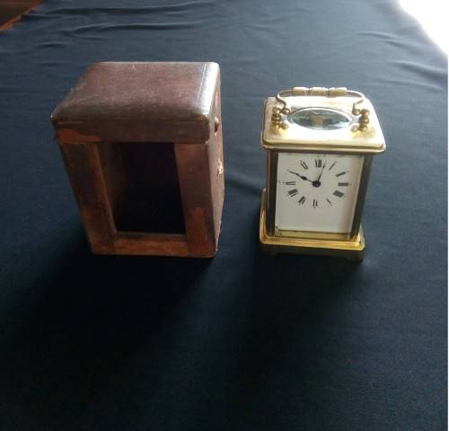 ANTIQUE FRENCH BRASS CARRIAGE CLOCK IN ORIGINAL CASE AND HAS ORIGINAL KEY