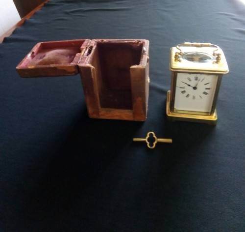 ANTIQUE FRENCH BRASS CARRIAGE CLOCK IN ORIGINAL CASE AND HAS ORIGINAL KEY