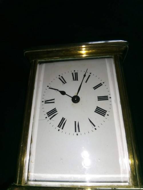 ANTIQUE FRENCH BRASS CARRIAGE CLOCK IN ORIGINAL CASE AND HAS ORIGINAL KEY
