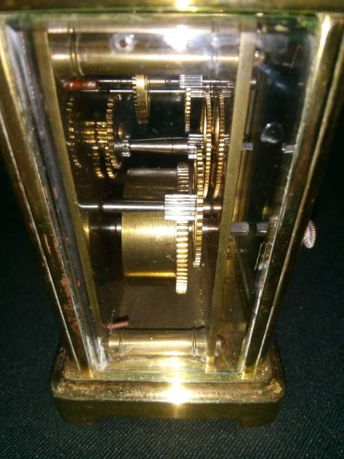 ANTIQUE FRENCH BRASS CARRIAGE CLOCK IN ORIGINAL CASE AND HAS ORIGINAL KEY