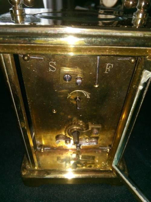 ANTIQUE FRENCH BRASS CARRIAGE CLOCK IN ORIGINAL CASE AND HAS ORIGINAL KEY