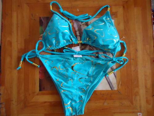 ladies  red   swimwear with foil gold pritn heart    30--34