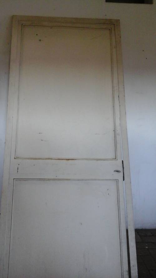 RIGID STEEL DOOR IN ITS OWN FRAME. JUST NEED TO CHANGE THE LOCK AS THERE IS NO KEY