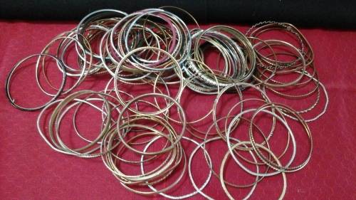 FANTASTIC COLLECTION OF COSTUME JEWELLERY BANGLES. TOO MANY TO COUNT