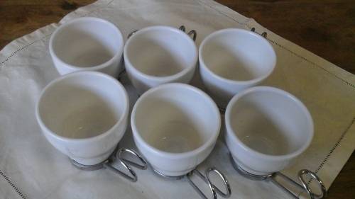 AN UNUSUAL SET OF SIX ESPRESSO CUPS WITH CHROME DETACHABLE HANDLES
