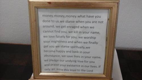 SOMETHING DIFFERENT A STORY ON MONEY IN A MAGNIFICENT GOLD FRAME. UNUSUAL