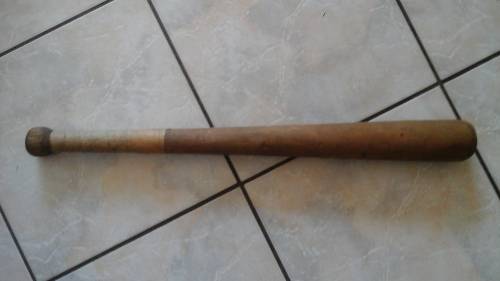 STRONG AND STURDY ROUGH AND READY EITHER WAY THIS VINTAGE BASEBALL BAT IS STILL SPECTACULAR