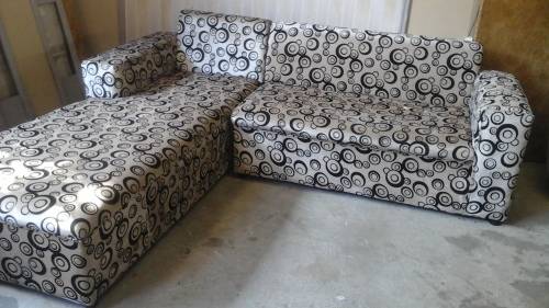 A COMPACT YET LARGE L SHAPED LOUNGE SUITE. HAS A VELVET FEEL TO IT. STUNNING