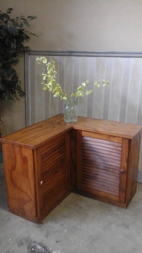 DEFINITLY DIFFERENT. A COMPACT CORNER PINE CABINET. IT MIGHT ONLY BE PINE BUT ITS STURDY AND STRONG