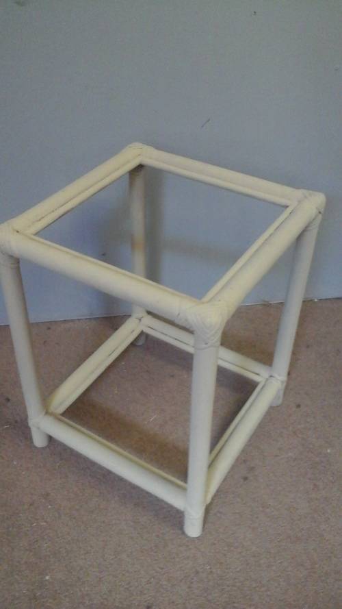 A STUNNING VINTAGE CHALK PAINTED SQUARE  CANE/RATTAN COFFEE TABLE. HAS A GLASS TOP AND A GLASS SHELF