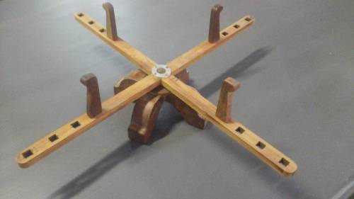 WOW WHAT A RARE FIND!!!!! A VINTAGE WINDER THAT IS SIZE ADJUSTABLE. JUST MOVE THE PEGS