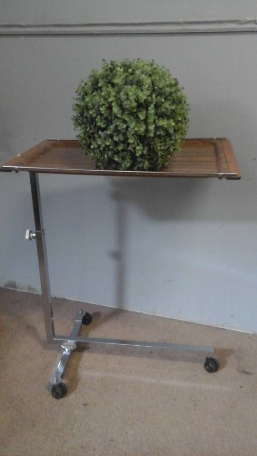 AN ABSOLUTELY AMAZING FULLY ADJUSTABLE VINTAGE BED TABLE. PERFECT FOR USE BY AN INVALID