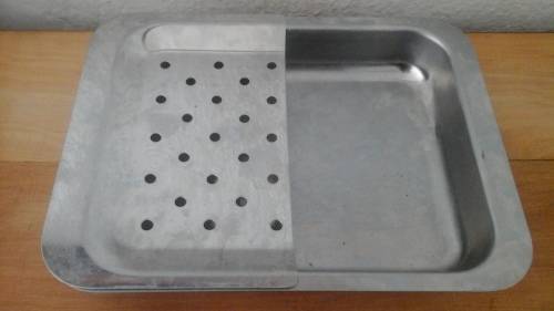 HANDY FOR YOUR HOME BAR AND ICE TRAY AND STRAINER COMBINED. MADE FROM STAINLESS STEEL