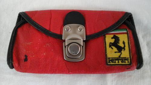 UNIQUE COLLECTIBLE FERRARI POUCH.  SLIP YOUR BELT THROUGH THE LOOPS AND YOU WILL BE THE ENVY OF MANY