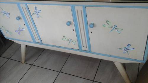 GORGEOUS VINTAGE PAINTED KIAAT THREE DOOR SIDE BOARD. HAS PICTURES OF DRAGONFLIES