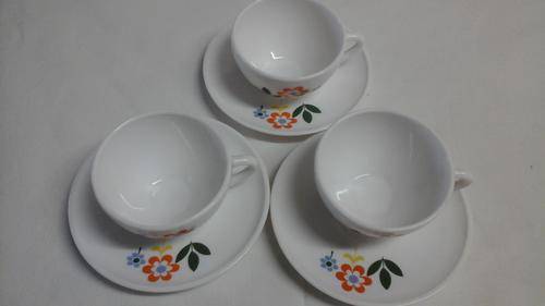 DELIGHTFUL LITTLE ESSPRESSO CUP AND SAUCERS. FLORAL PATTERN ON SAUCER AND CUP