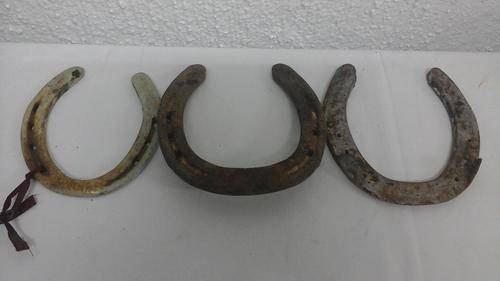 COLLECTION OF THREE ORIGINAL VINTAGE HORSE SHOES.SO AMAZING TO BE BELIEVE THEY WHERE ONCE ON A HORSE