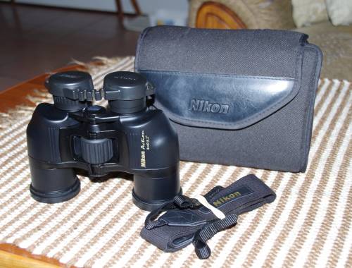 Nikon Action Binoculars in emaculate contiion, photos show actual item on sale, caps case and strap