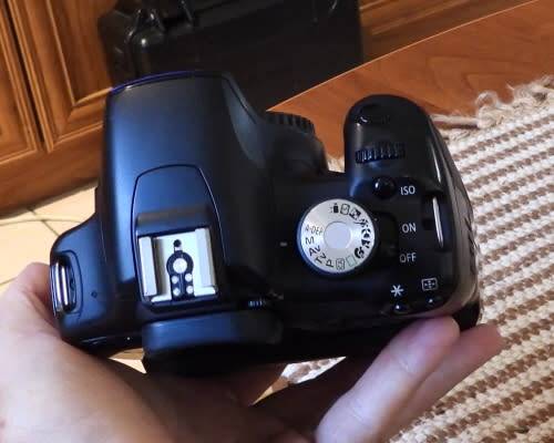 Canon 500D Body only with battery grip, one battery, photos show exact item on sale. works perfectly