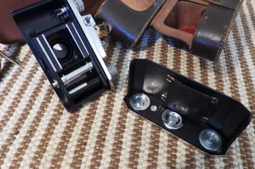 Old Bolex 8mm movie and a small film camera, photos show exact items, sold as pair
