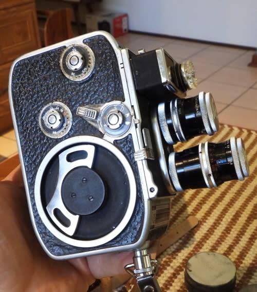 Old Bolex 8mm movie and a small film camera, photos show exact items, sold as pair